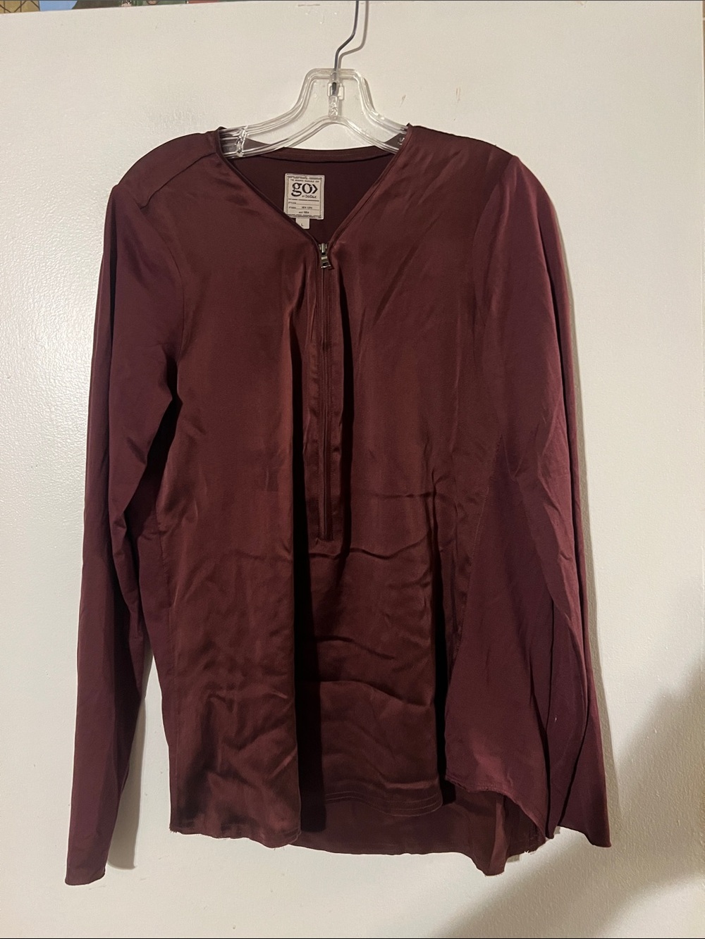 Go silk wine color long sleeve top. Zip front detail
